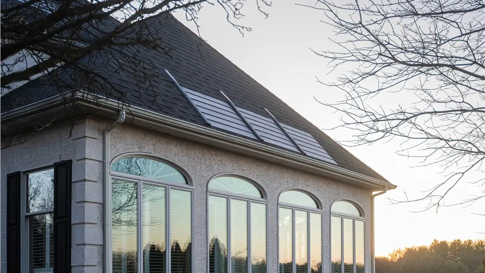 Roof-mounted solar array on a two-story home